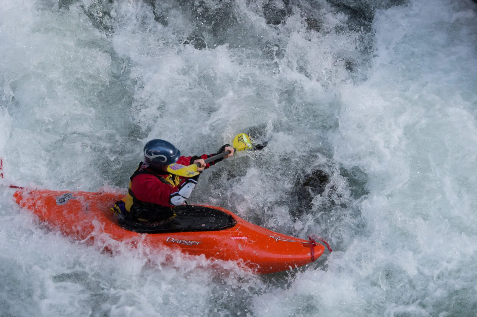 Red Kayak in white rapids